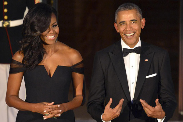 Vợ chồng Obama dự hội nghị